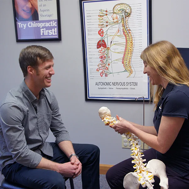 Chiropractic Knoxville TN Kelli Friedmann With Patient Chiropractic Knoxville TN Kelli Friedmann With Patient